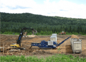 Pioneer Biomass Grinder is on site grinding wood waste to be used for pellets and hog fuel