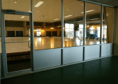 The wall included the installation of a door for public access and a automatic sliding door for handicap access.