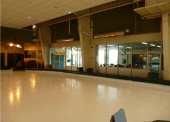 The purpose of the wall was to provide separation between the lobby and the two ice surfaces.