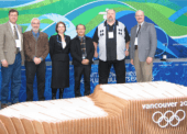 One of fourteen podiums made from wood donated by community forests. One of fourteen podiums made from wood donated by community forests.