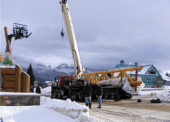 A truck and crane are used in the delivery and construction of the arch at the entrance to Valemount's downtown. A truck and crane are used in the delivery and construction of the arch at the entrance to Valemount's downtown.