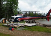 The surveys are conducted using airborne and ground techniques to identify potential exploration sites for mining projects by reporting soil properties and rock density. 